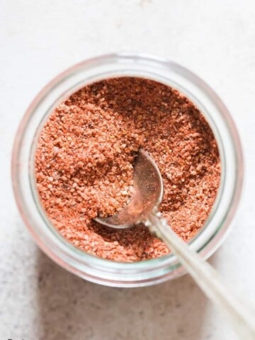 homemade salt seasoning in glass jar with spoon