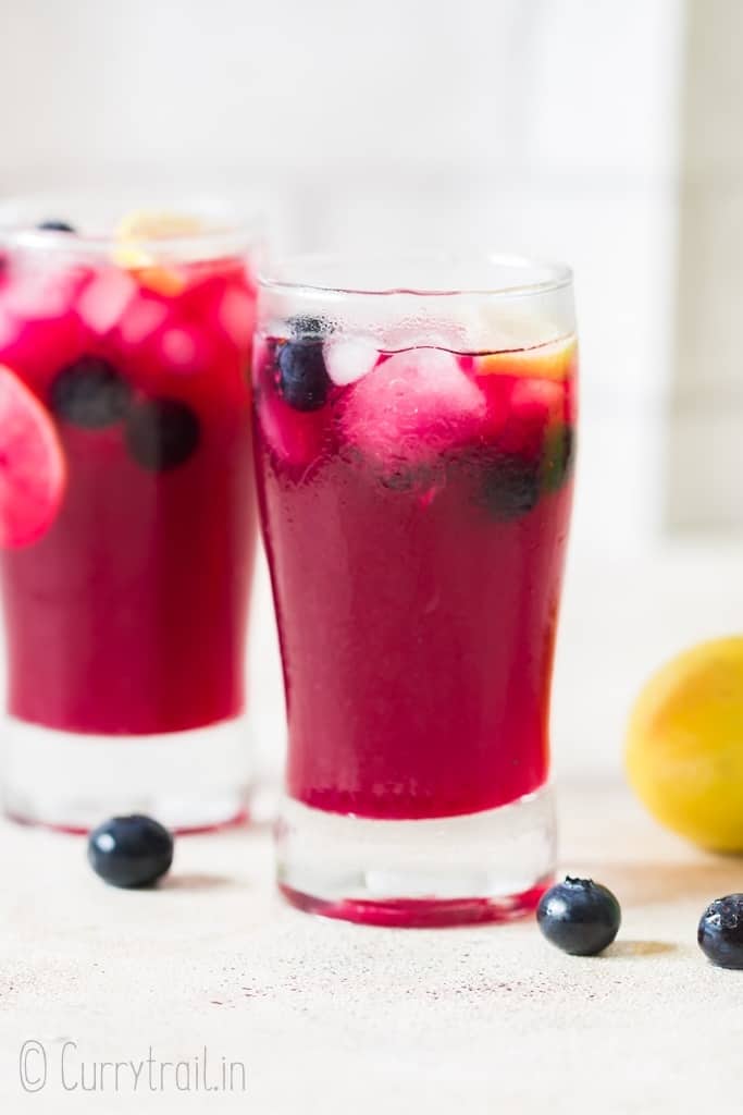 pink lemonade blueberry served in two glasses