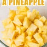 chunks of pineapple in bowl with text