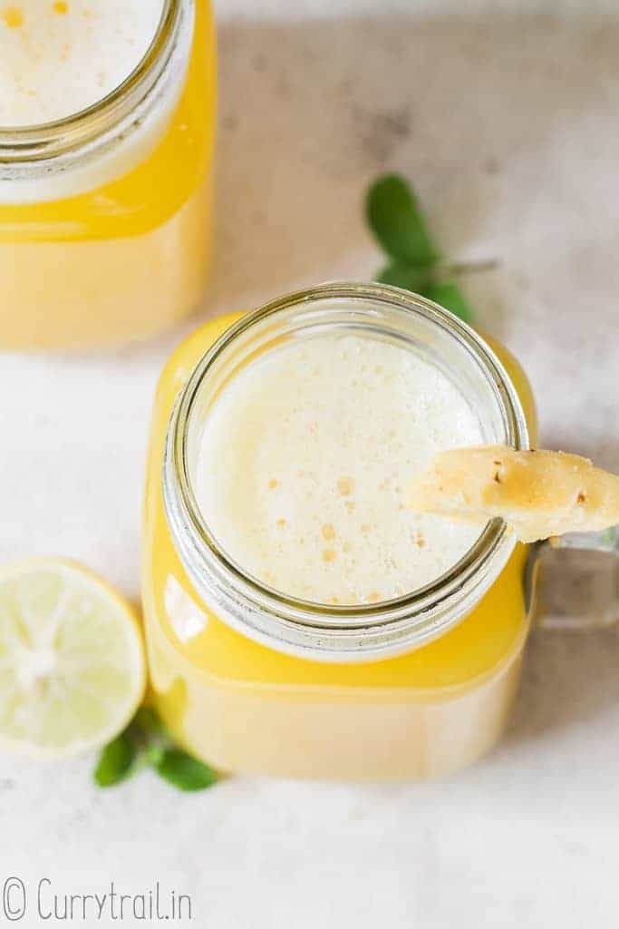 light pineapple juice in two jars
