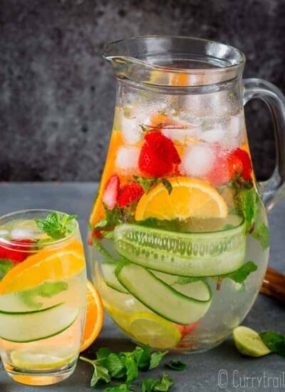 detox fruit infused water in pitcher and glass