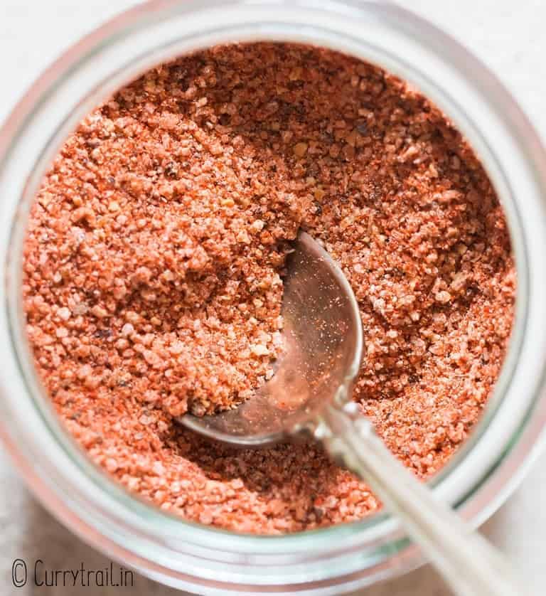 homemade salt seasoning in glass jar with spoon