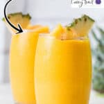 anti inflammatory pineapple smoothie in two glasses with text overlay