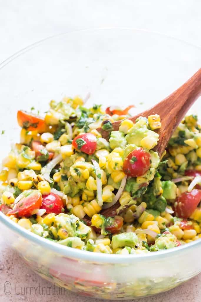 grilled sweet corn on the cob salad missed in a bowl.