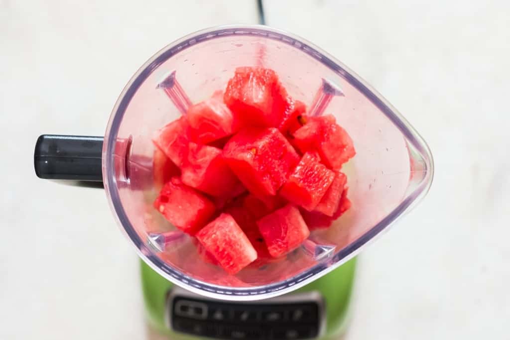 making watermelon margarita in blender by blitzing fresh watermelon