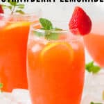 fresh strawberry lemonade served in glasses with strawberry and mint leaf garnish with text