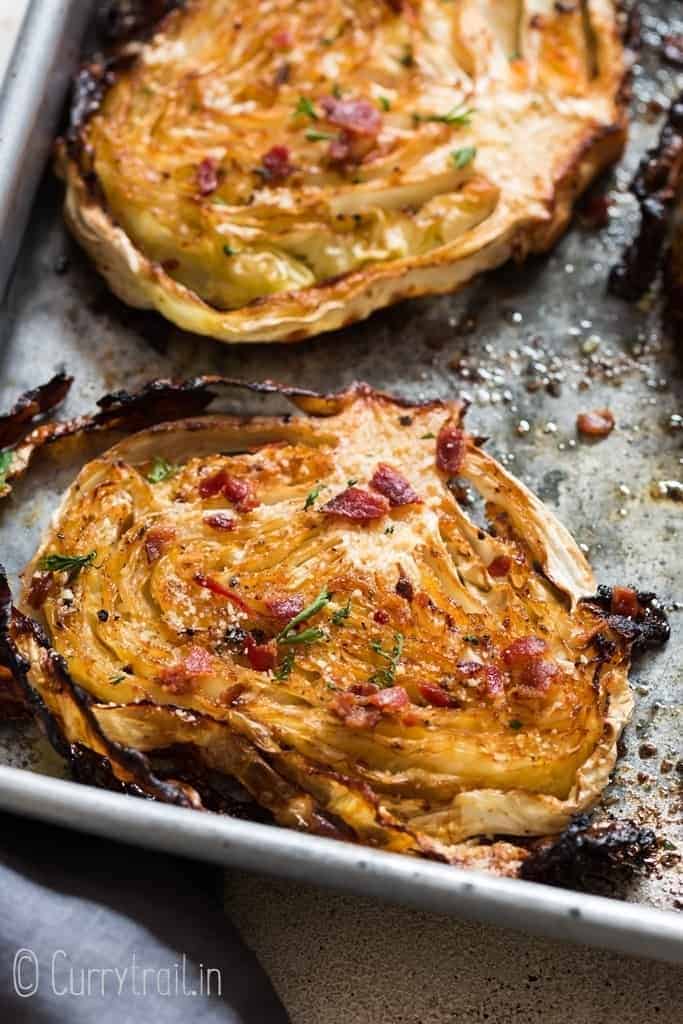healthy oven roasted cabbage with bacon and Parmesan on baking tray