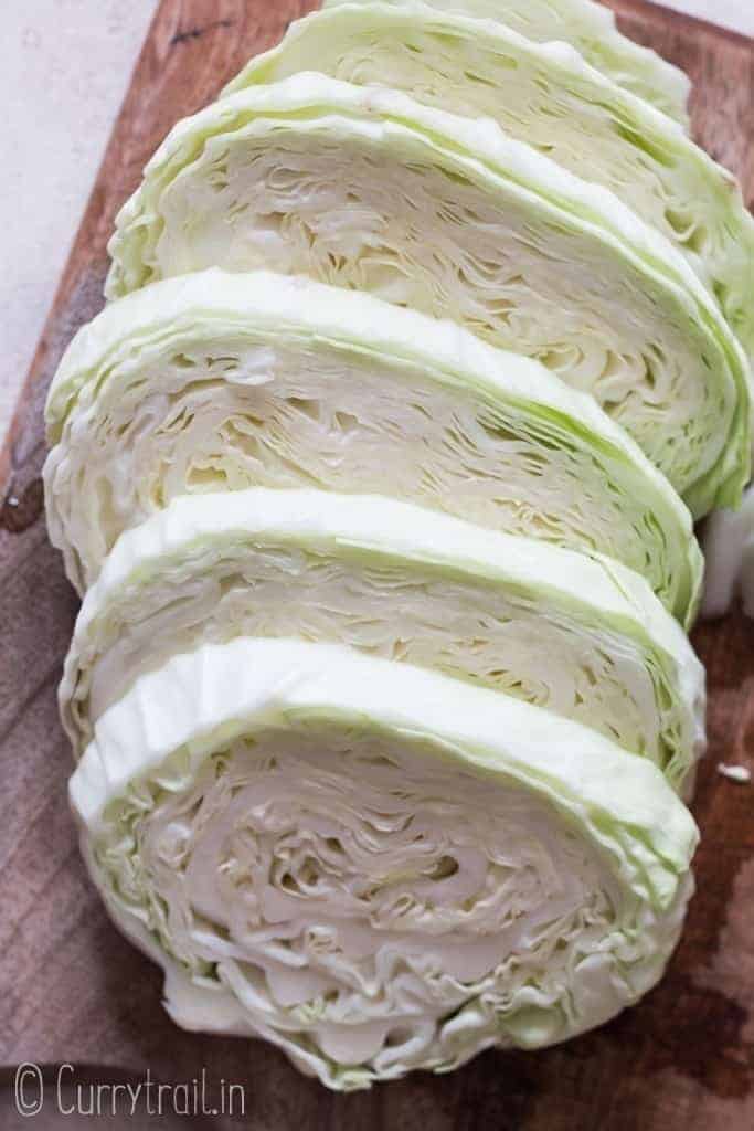 thick cabbage steaks cut and ready to be roasted.