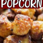 baked popcorn made of cauliflower florets served with chili sauce on white plate