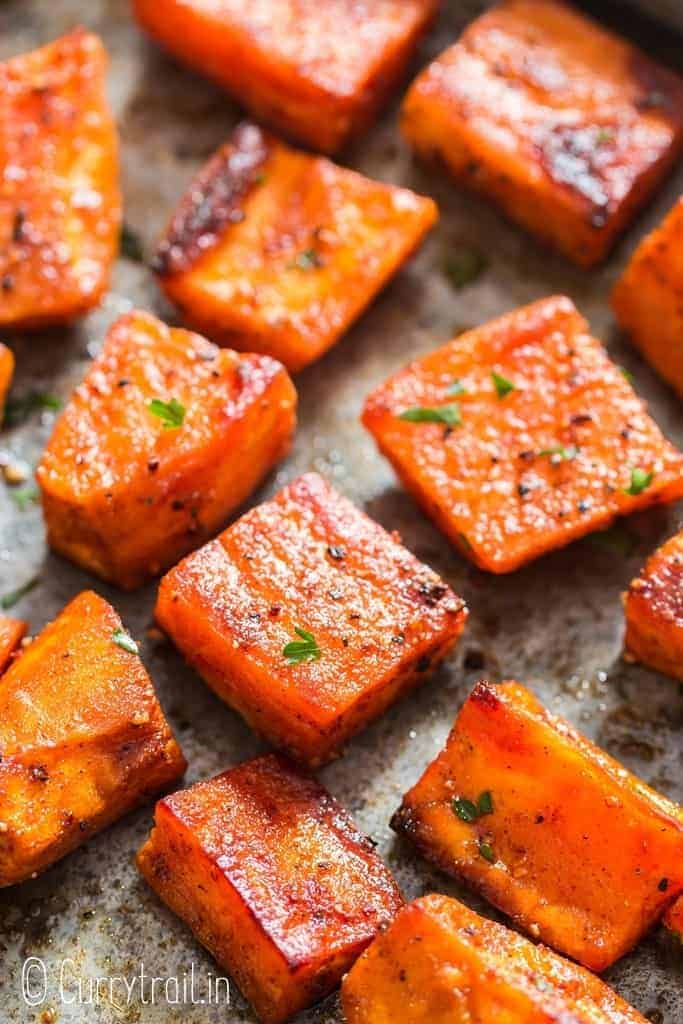 spicy and savory sweet potato roast on baking tray