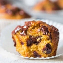 chocolate chip pumpkin muffins on paper liners