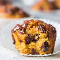 chocolate chip pumpkin muffins on paper liners