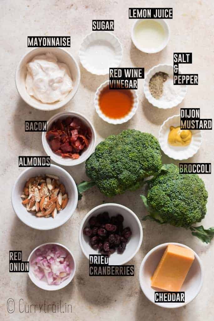 ingredients for healthy salad using broccoli on white board