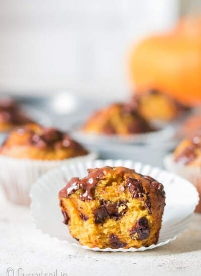 chocolate chip pumpkin muffins on paper liners