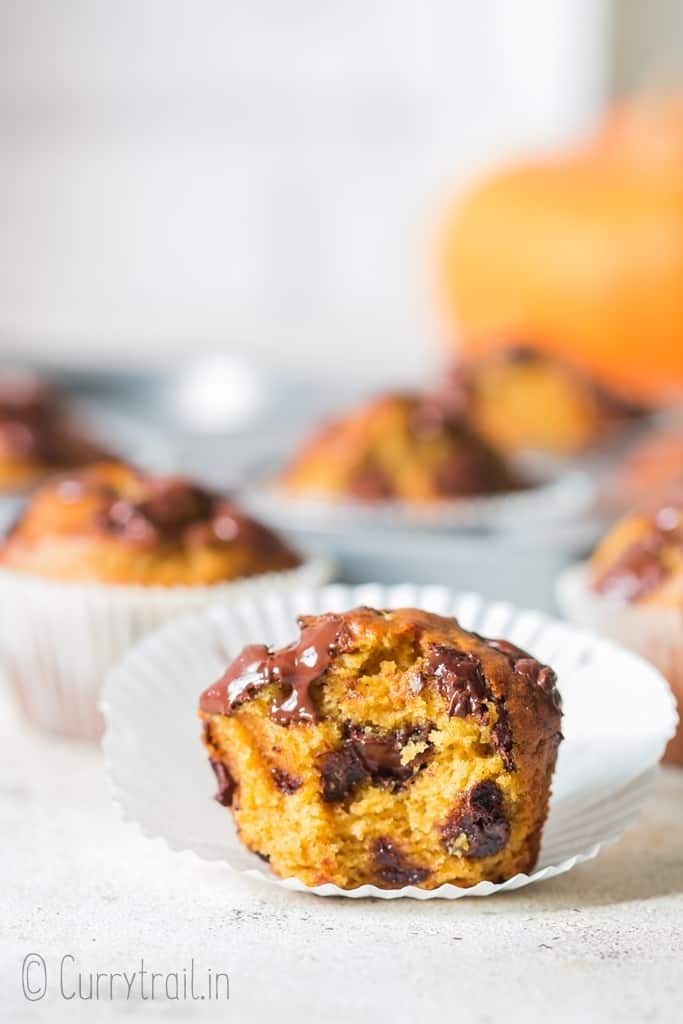 chocolate chip pumpkin muffins on paper liners