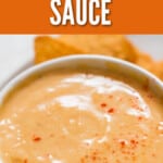close up view of spicy cheese sauce in a bowl with nachos with text overlay.
