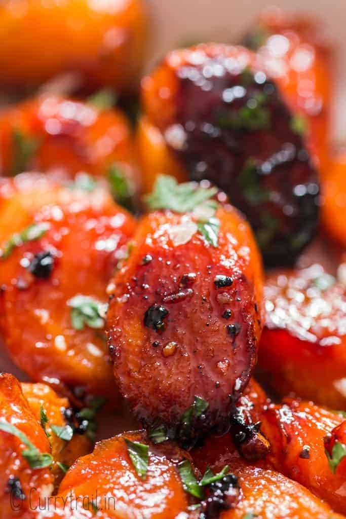 honey glazed carrots served in white ceramic bowl