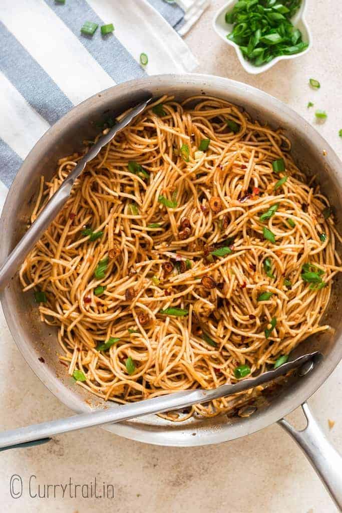 chili garlic noodles cooked in a skillet