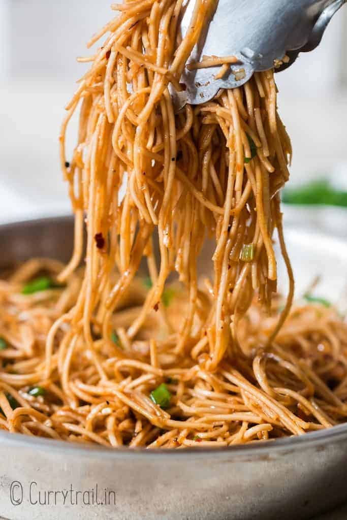 chili garlic noodles cooked in a skillet