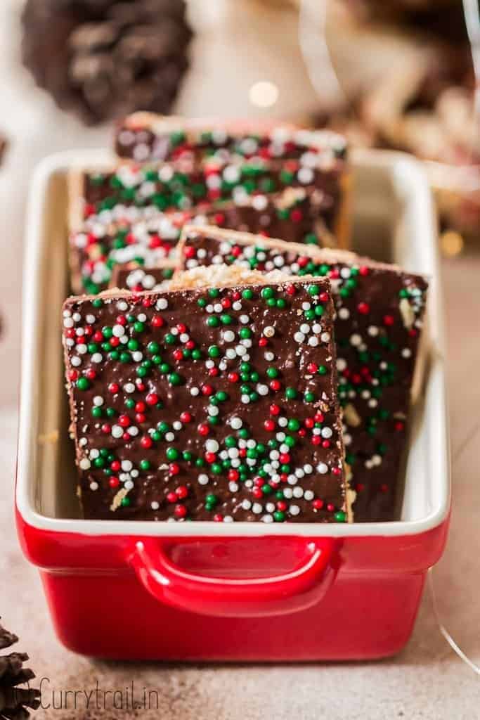 stacks of toffee crack candy with sprinkle toppings