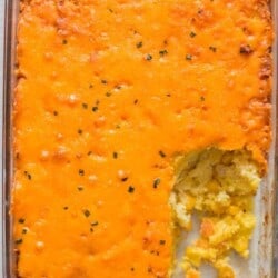 cheesy sweet corn casserole in casserole dish