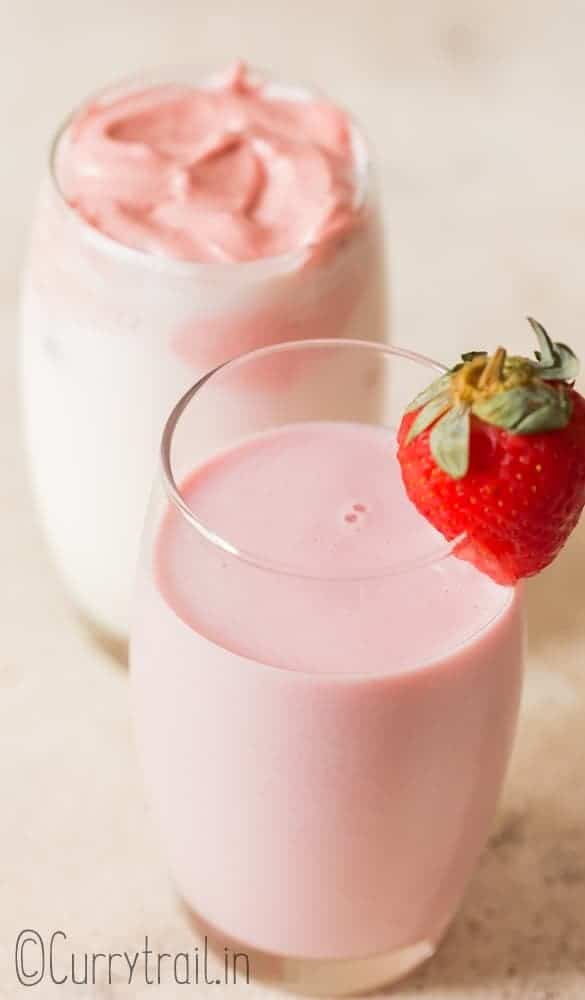 strawberry milk recipe made 2 ways served in glass