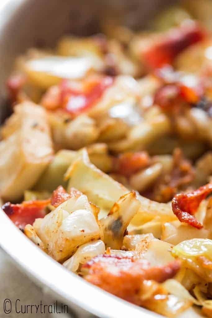 close up view of southern fried cabbage in skillet