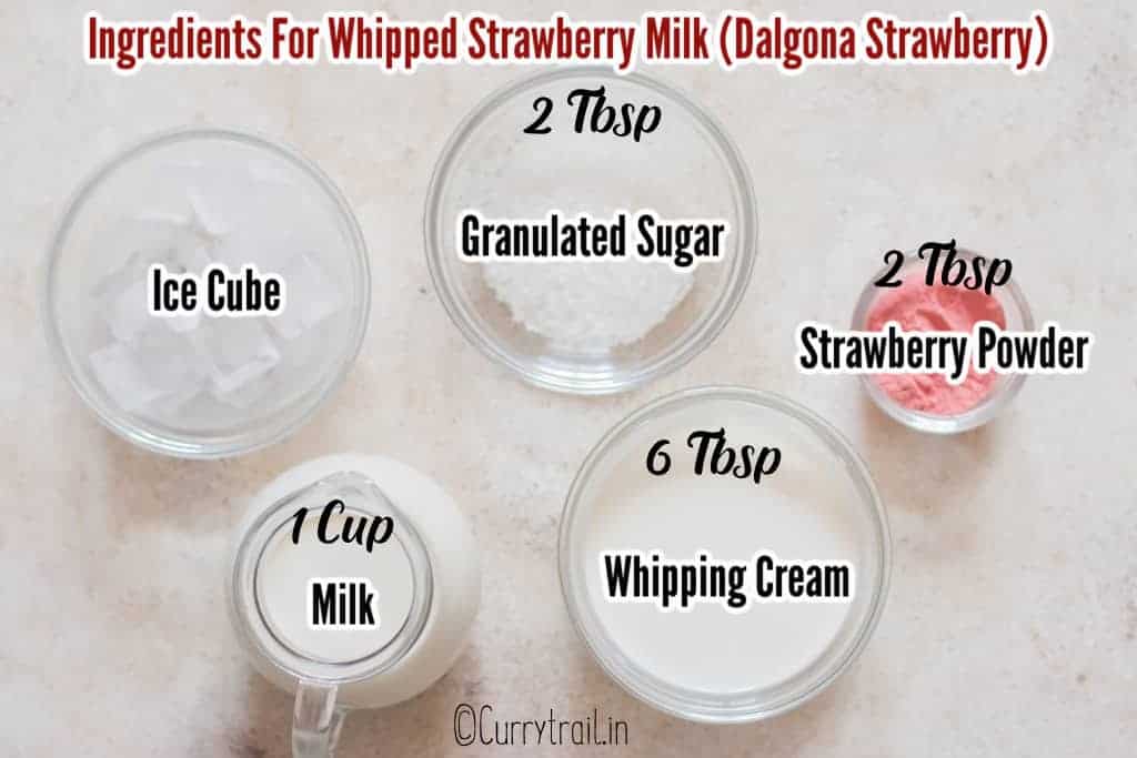 all ingredients to make dalgona strawberry milk on white board