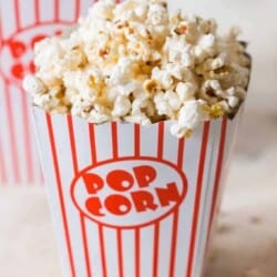 homemade movie popcorn in 2 popcorn tubs
