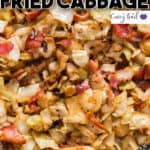 fried cabbage with bacon cooked in skillet with text