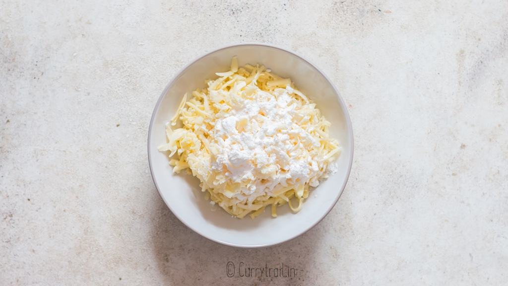 fresh grated cheese coated in cornflour.