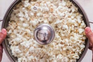 shaking popcorn in large tub made on stove top