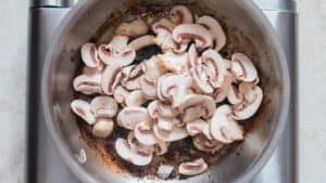 saute button mushrooms in skillet