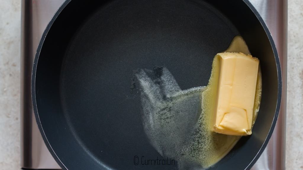 melting butter to make buffalo hot sauce