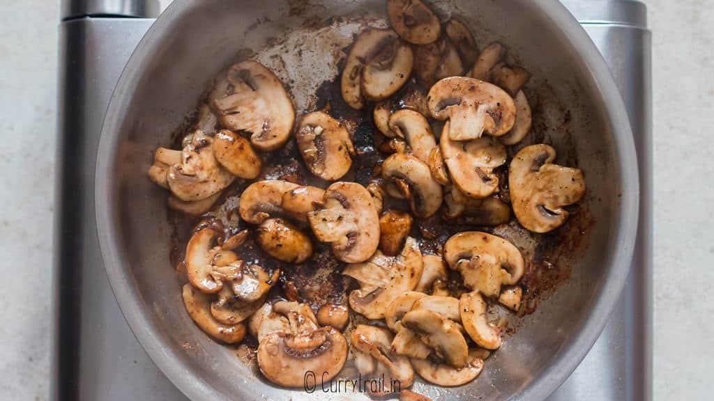 saute button mushrooms in skillet