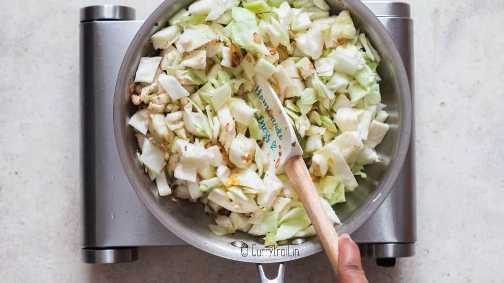 making fried cabbage in skillet pan