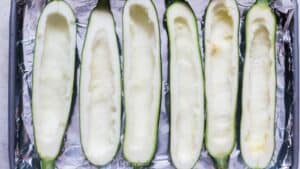 zucchini boats arranged on sheet pan