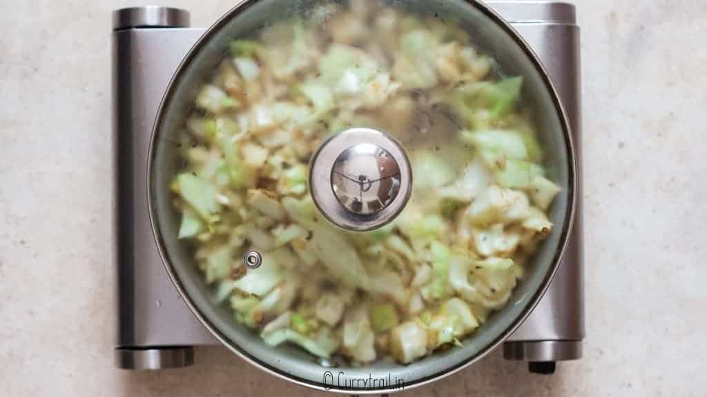 making fried cabbage in skillet pan