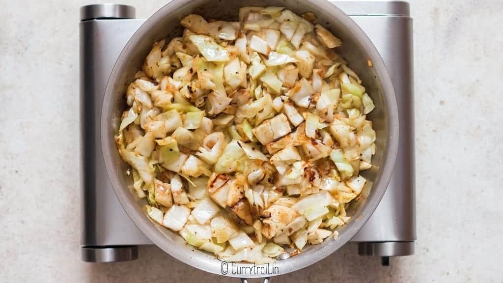 making fried cabbage in skillet until cabbage is softened