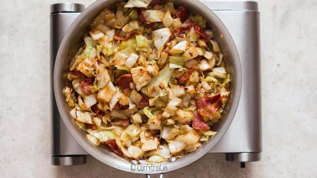 cooking southern fried cabbage in skillet