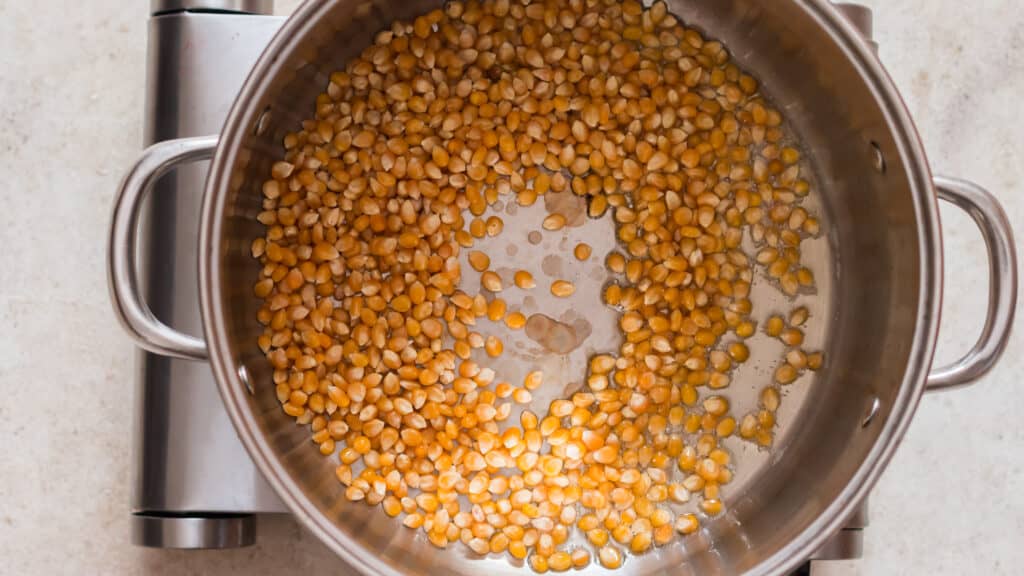 popcorn kernels in large pot to make movie style popcorn