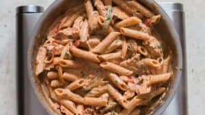 cooked pasta in vegetable cream sauce to make creamy cajun chicken pasta recipe