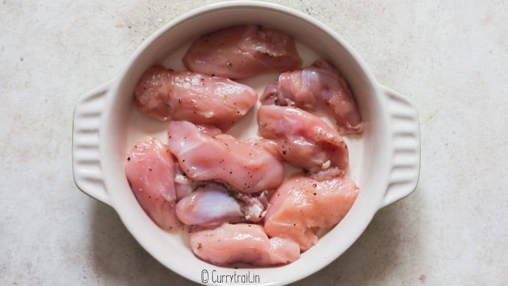 seasoned chicken ready to be cooked in oven