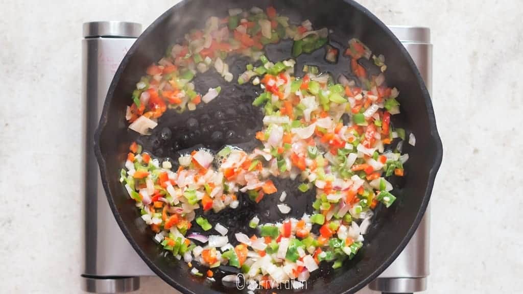 sauté bell peppers, onion, and garlic in a cast iron skillet. 