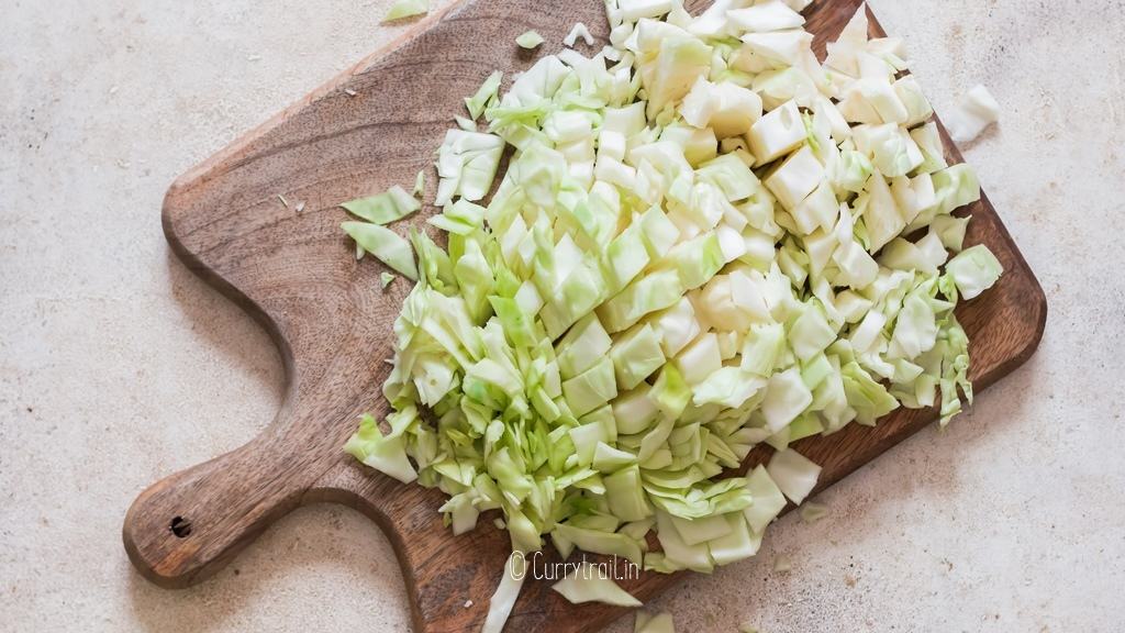 chopping cabbage into bite size pieces