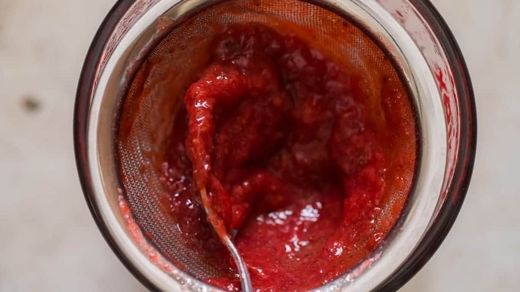 strawberry sauce filtered in sieve