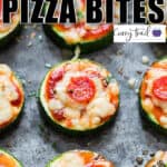 zucchini pizza bites on baking tray with text overlay
