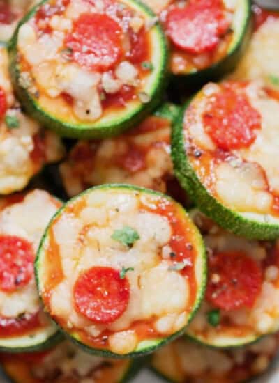 zucchini bite-size pizza on a plate.