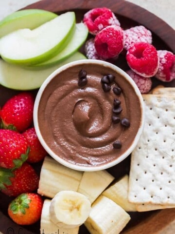 healthy dessert hummus platter with fruits and crackers