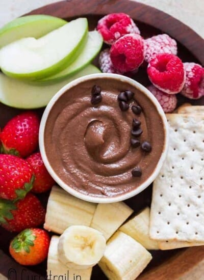 healthy dessert hummus platter with fruits and crackers